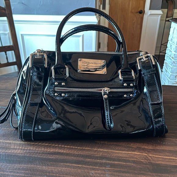 Dolce & Gabbana Handbags - Black Dolce Gabbana Miss Patent leather purse. Barely used no longer need.